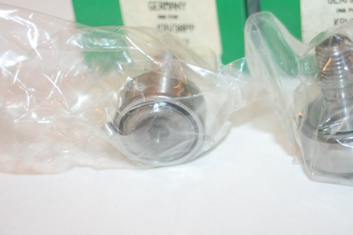 Stud type track roller